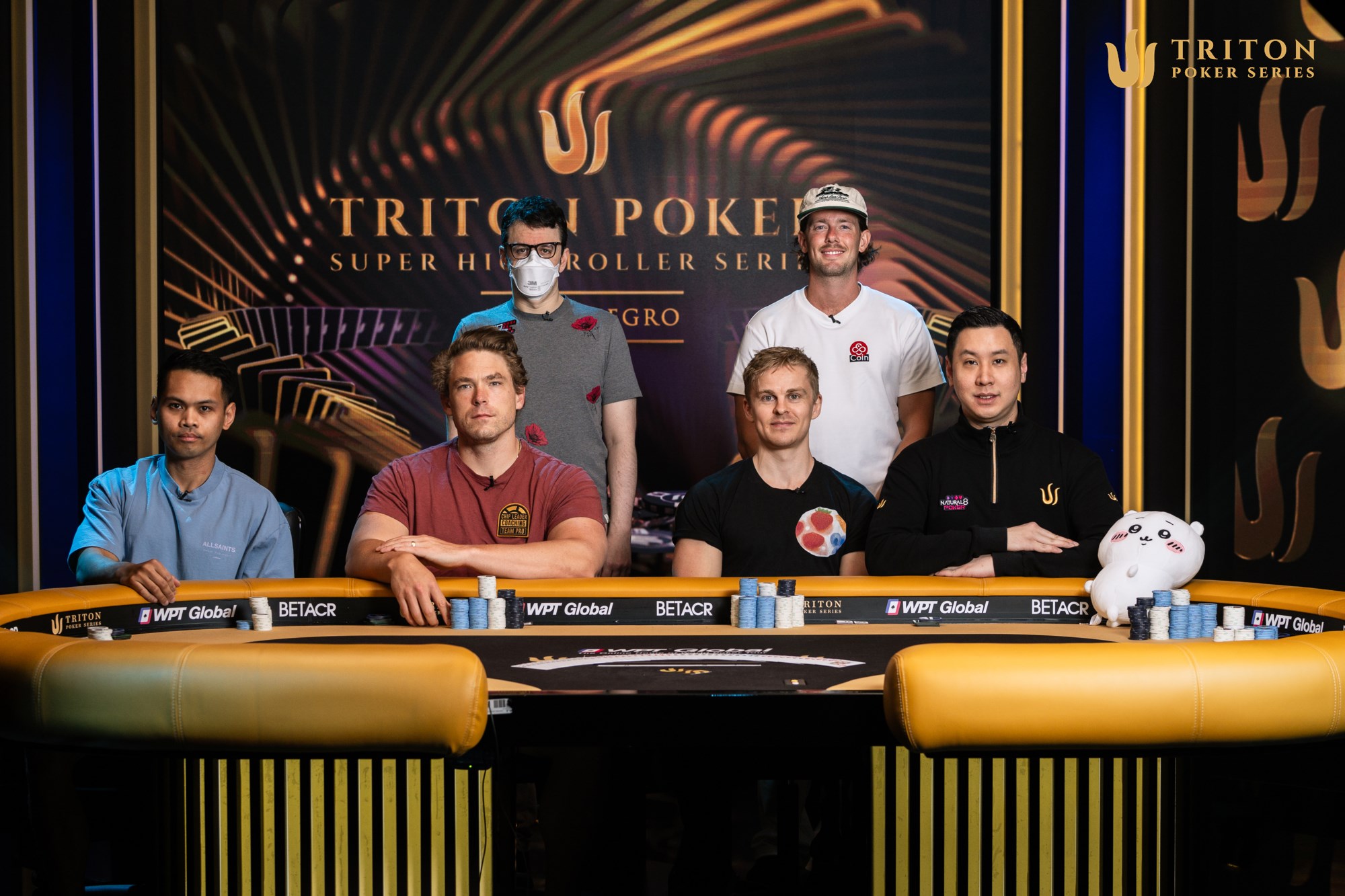 Triton Montenegro Event 13 final table players (clockwise from back left): Isaac Haxton, Dirk Gerritse, Punnat Punsri, Martin Dam, Alex Foxen, Sean Rafael