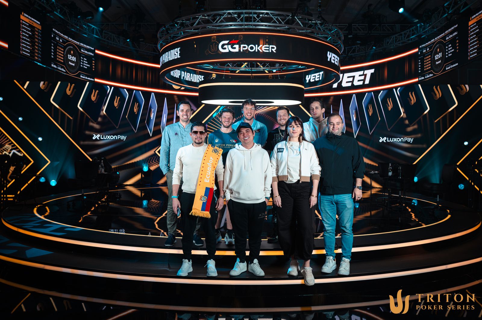 Triton Invitational final table players (l-r): Sergio Aido, Gabriel Andrade, Jonathan Jaffe, Cong Pham, Thomas Boivin, Tyler Stafman, Monika Hrabec, Albert Daher, Kayhan Mokri.