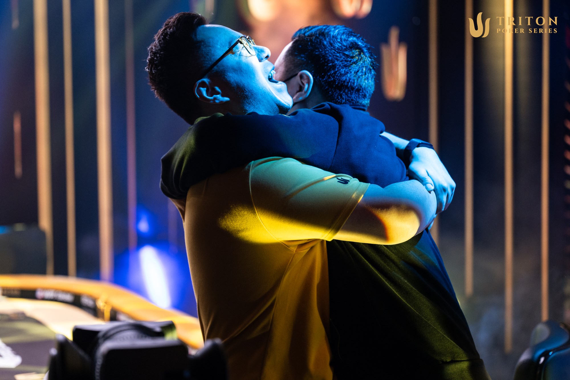 Danny Tang, left, is first to celebrate with his friend Punnat Punsri