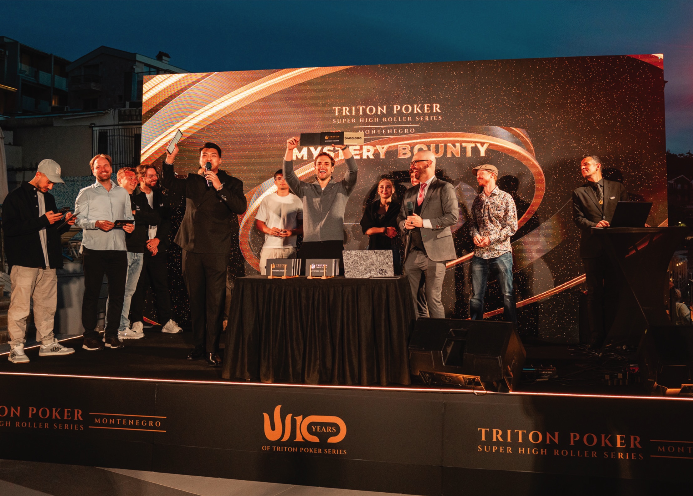 Two Triton outfits photographed at the tables